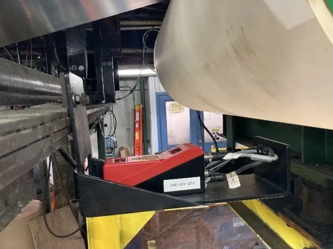 Existing edge sensor mounted at coil line